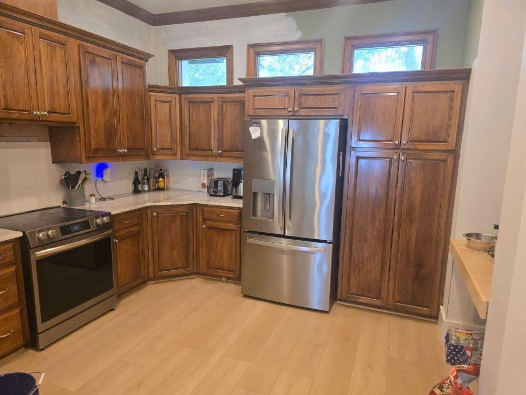 Kitchen before, range wall