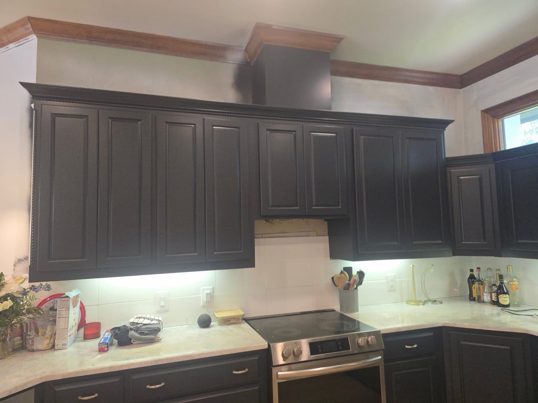 Same kitchen in charcoal, marble counters