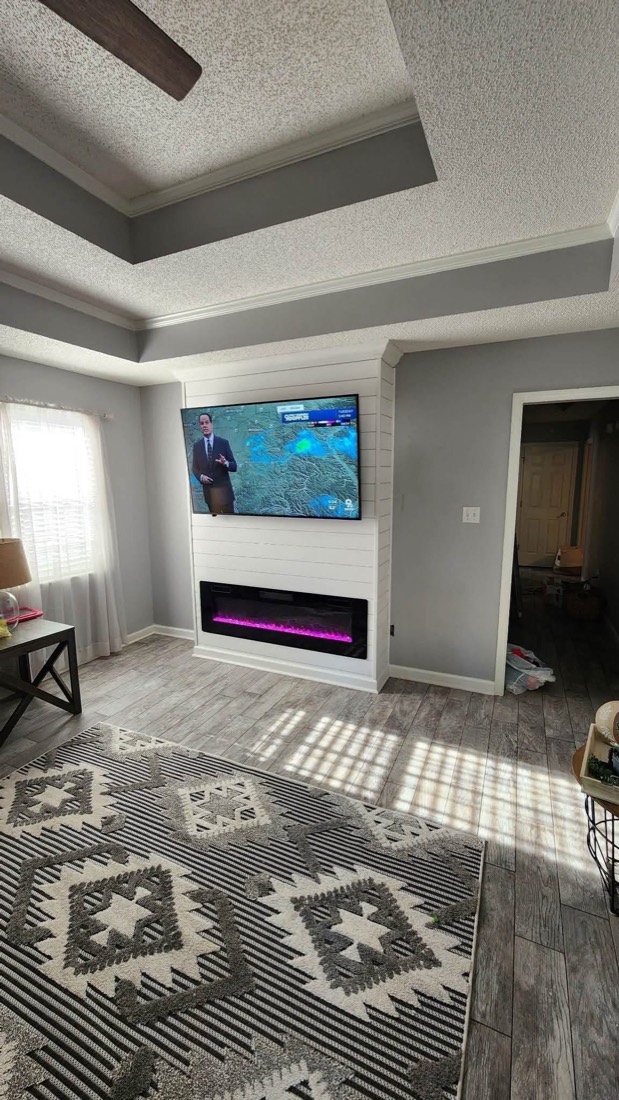 Shiplap media wall with a recessed electric fireplace