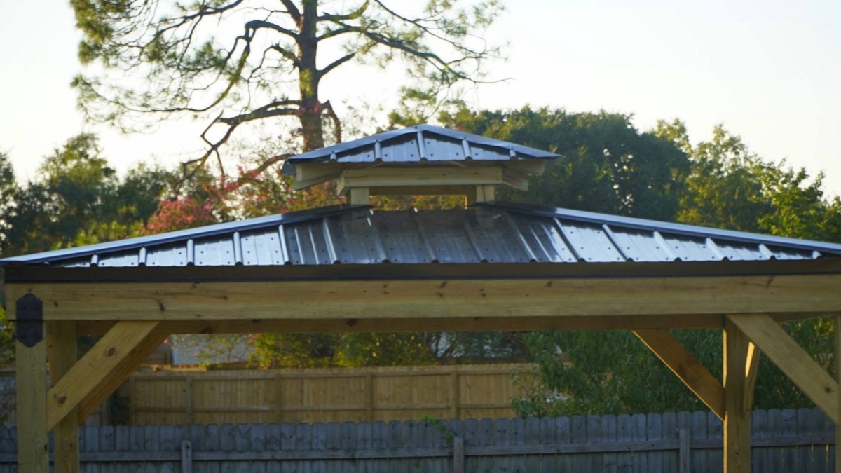 Timber gazebo with a double metal roof on a new concrete pad